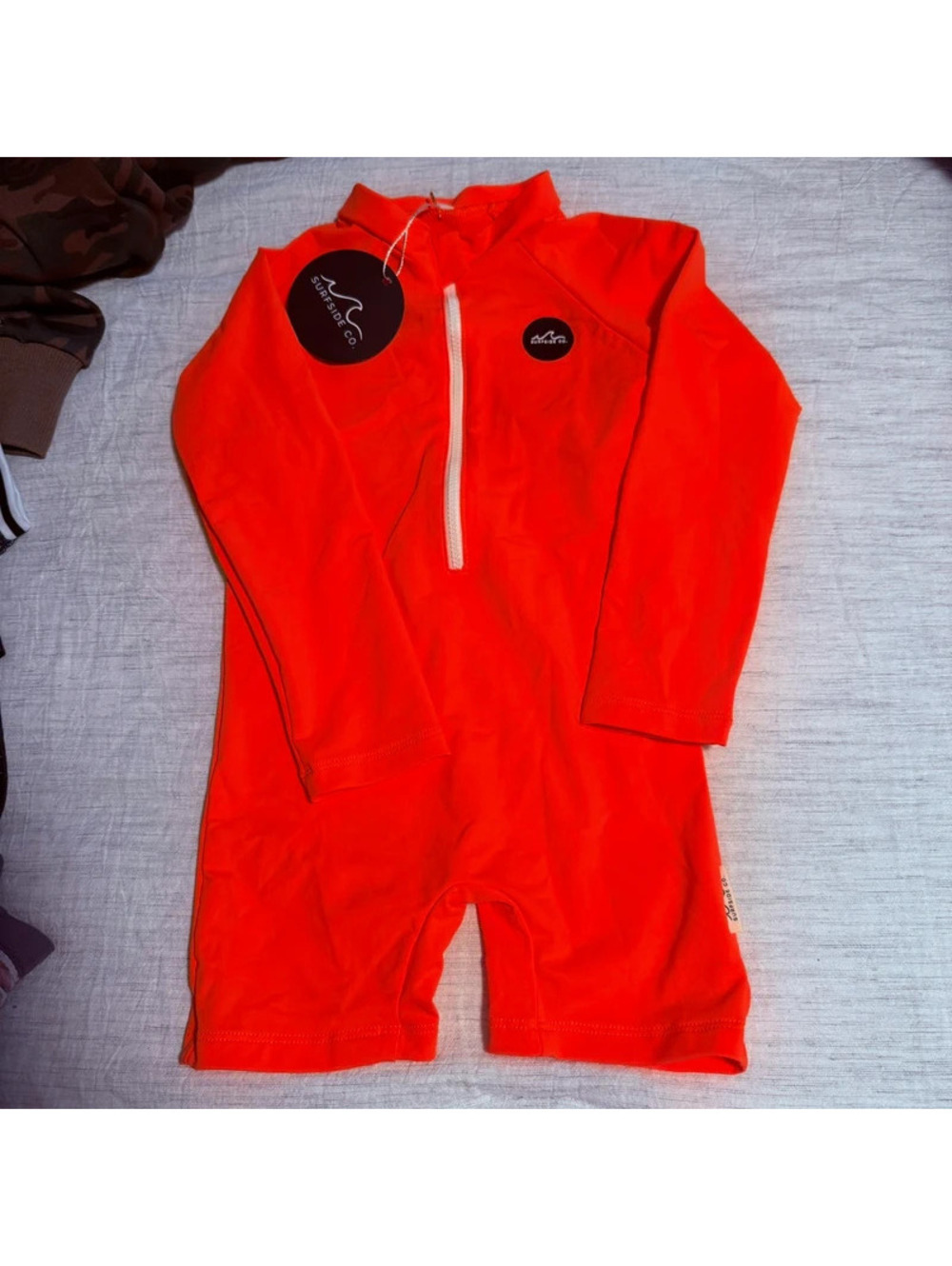 Surfside co orange sunsuit rash guard